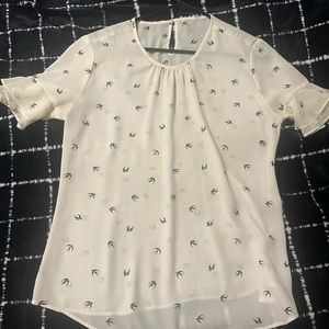 Chic Cream Blouse with Bird Print